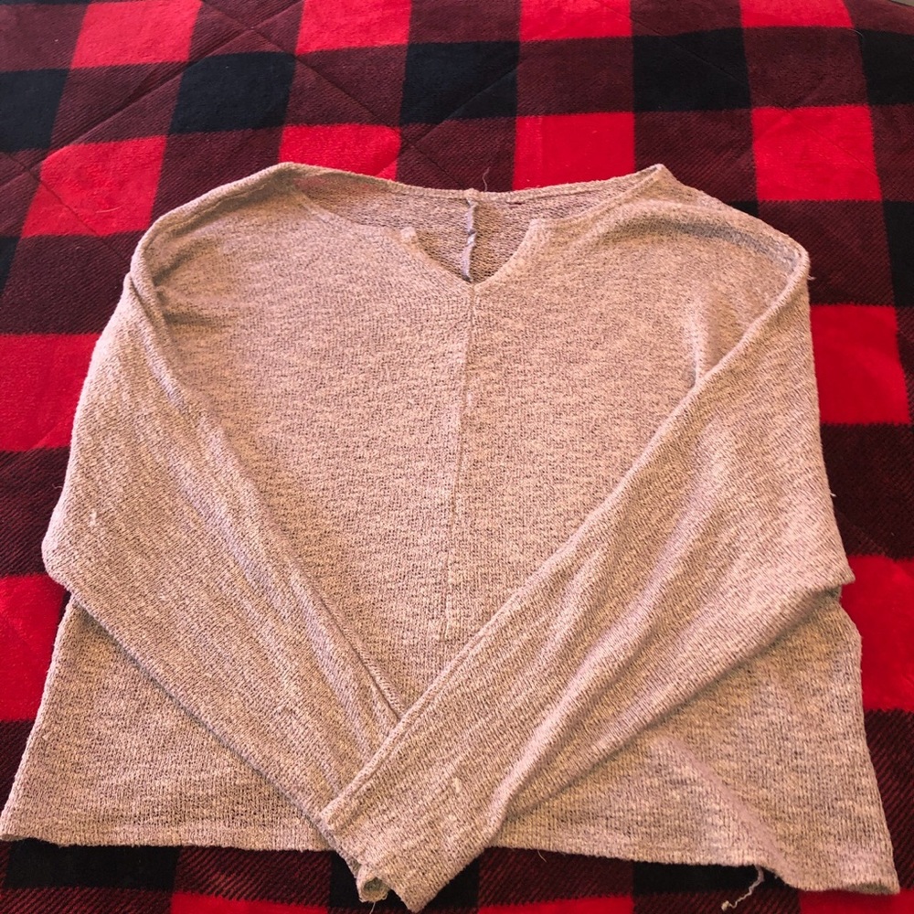 Long sleeve light lavender shirt with a V neck